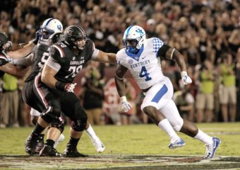 Josh Paschal playing football